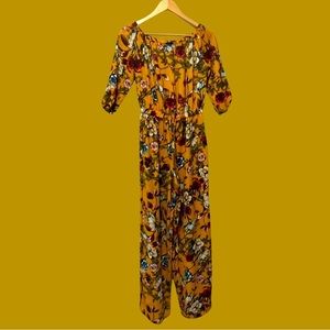Mustard yellow jumpsuit with flowers